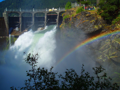 Glines Canyon Dam spillway (now decommissioned) with rainbow across the canyon