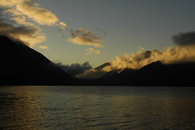 Washington State's Lake Crescent pictured at dusk with colorful clouds